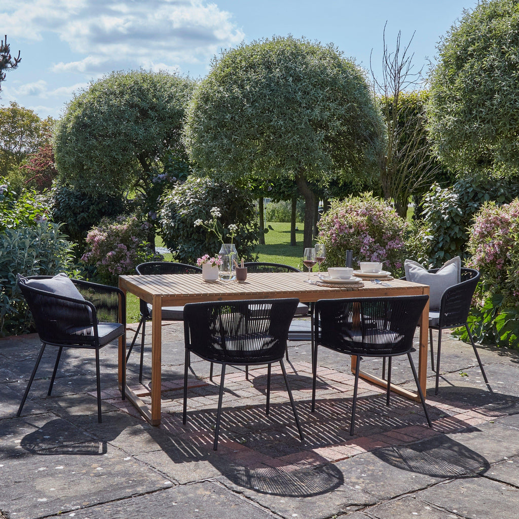 Lennox Table with 6 Black Hali Dining Chairs — garden dining set from 2nd Time Around